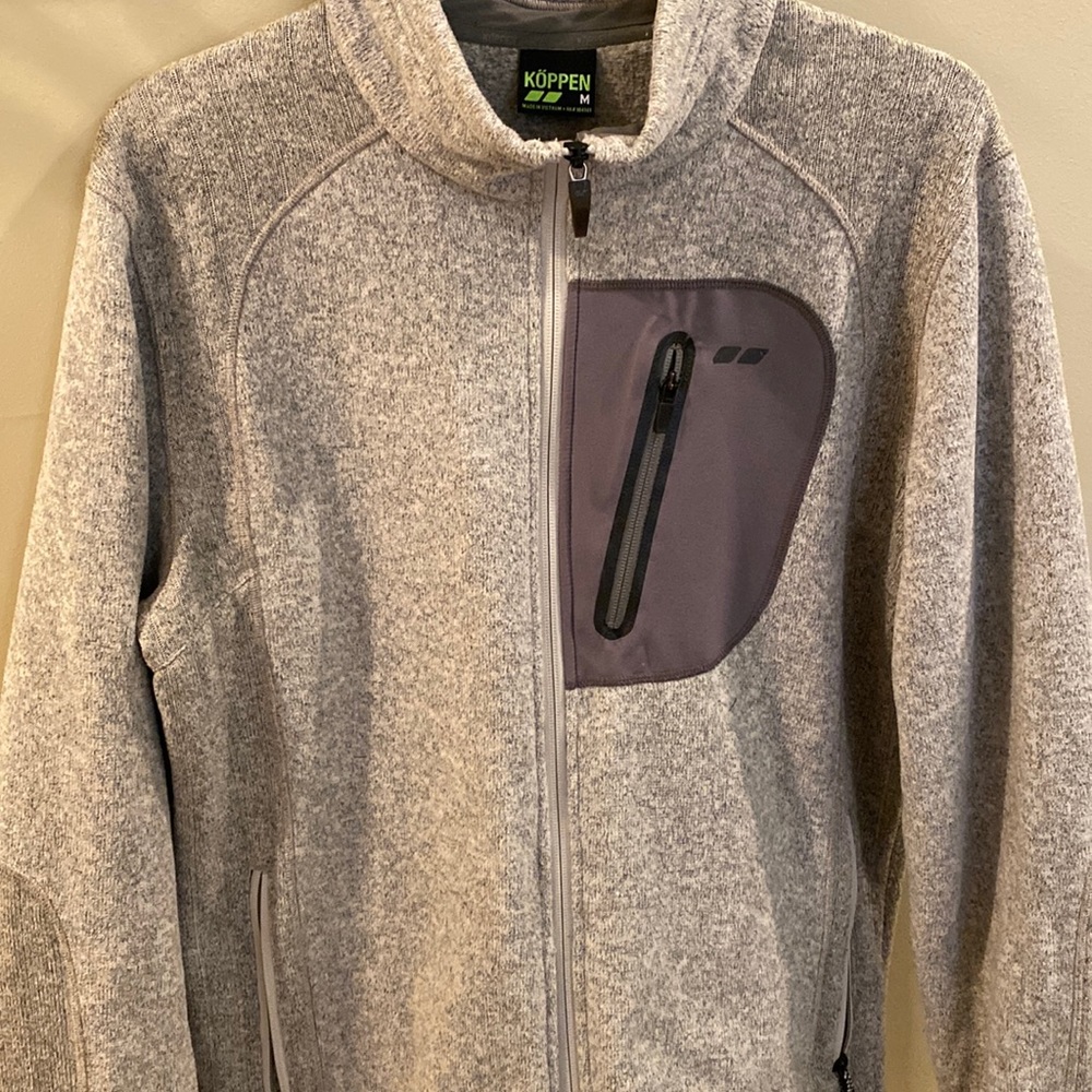 Neutral colored zip up jacket